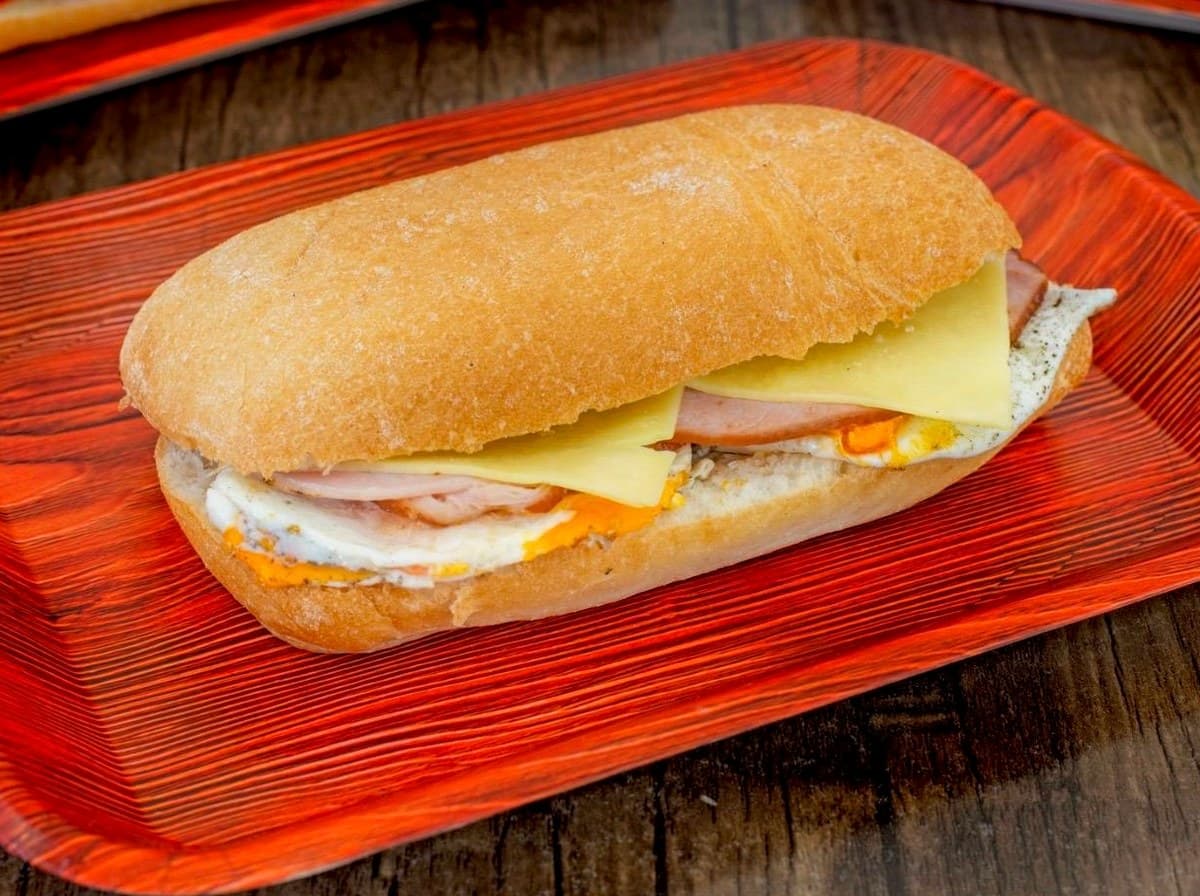 An egg and bacon roll from Friend Hub's all-day breakfast menu